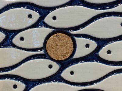 Gestileerde vissen om een kurk